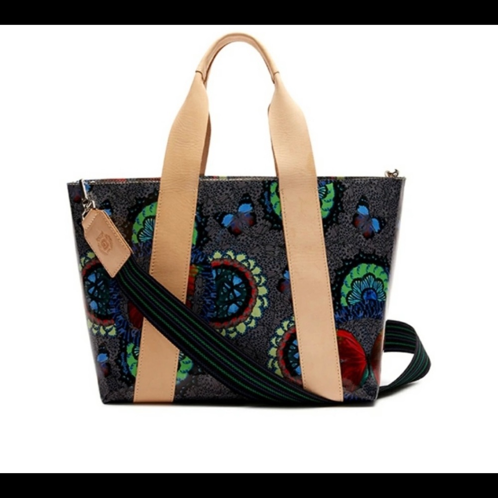 Consuela Jessi carryall, clutch and two bag charms.
